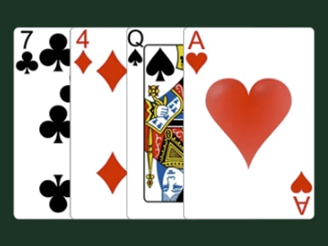 A French-suited playing card deck laid out on the GreenCloth table.